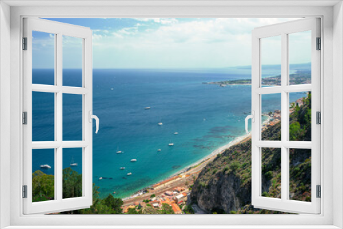 Fototapeta Naklejka Na Ścianę Okno 3D - Photograph of the coast of Taormina in Sicily, houses, boats and trees.