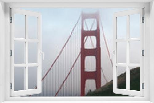 Fototapeta Naklejka Na Ścianę Okno 3D - Golden Gate behind the hills