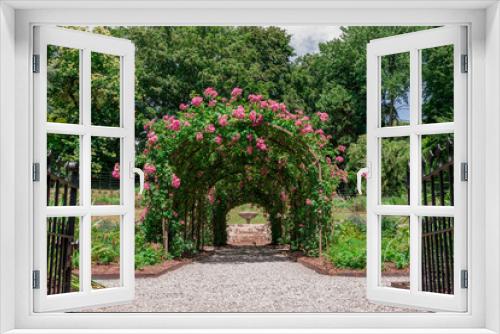 Fototapeta Naklejka Na Ścianę Okno 3D - Formal rose garden with arching trellises