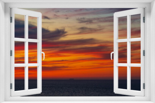 Fototapeta Naklejka Na Ścianę Okno 3D - Panoramic view of the ocean sunset against the background of multi-colored stratus clouds. Natural background for abstract reflection, relaxation, blank for designers, visual images, unique moments