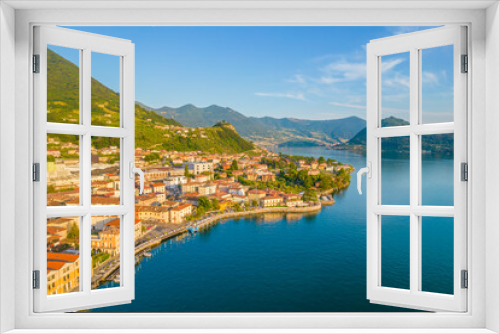 Fototapeta Naklejka Na Ścianę Okno 3D - Marone, Lake Iseo. Aerial panoramic sunset view of Marone town surrounded by mountains and located in Iseo Lake, Brescia, Lombardy, Italy