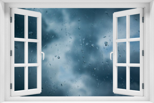 Fototapeta Naklejka Na Ścianę Okno 3D - Rain drops on window across clouds