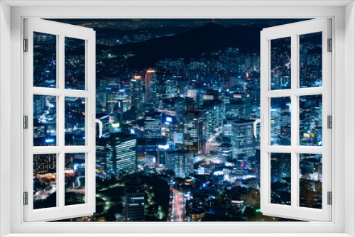 Fototapeta Naklejka Na Ścianę Okno 3D - Seoul night view, a picture that reminds me of a blue neon sign