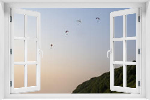 Fototapeta Naklejka Na Ścianę Okno 3D - Paraglider flying in the blue sky