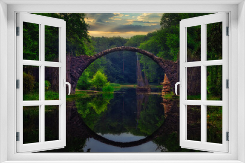 Fototapeta Naklejka Na Ścianę Okno 3D - Mystisch - Rakotzbrücke - Teufelsbrücke - Herbst - Brücke - See - Spiegelung - Kromlau - Rhododendron Park - Sachsen - Deutschland - Devil's Bridge - Autumn Landscape - High quality photo