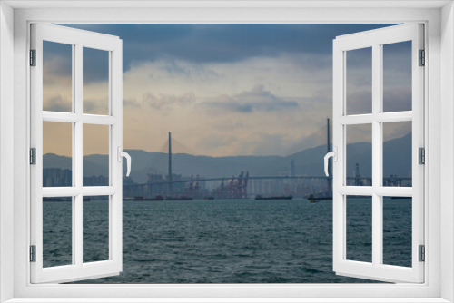 Fototapeta Naklejka Na Ścianę Okno 3D - Tsing Ma Bridge and cityscape by the sea in Hong Kong