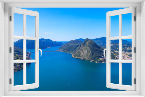 Fototapeta Naklejka Na Ścianę Okno 3D - Scenic view of lake Lugano from Monte Bre mountain in Ticino canton, Switzerland