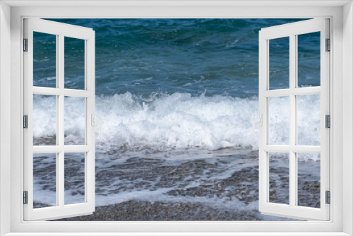 Fototapeta Naklejka Na Ścianę Okno 3D - A soft wave runs on a sandy shore on a summer day. Empty space can be used as background for display or montage your top view products.