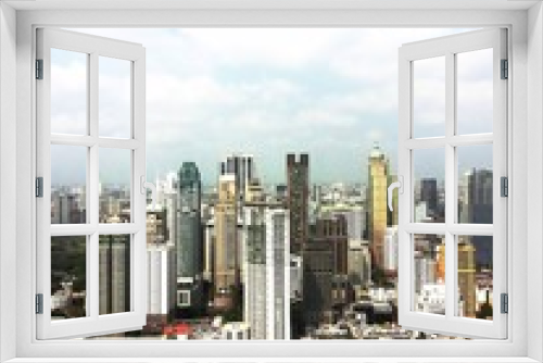 Fototapeta Naklejka Na Ścianę Okno 3D - many high buildings with sky behide