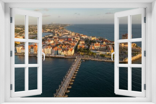 Fototapeta Naklejka Na Ścianę Okno 3D - Drone view of a small town near the sea