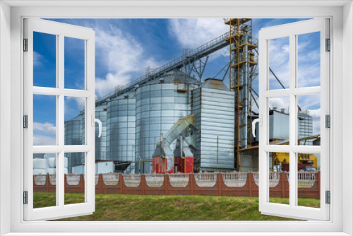 Fototapeta Naklejka Na Ścianę Okno 3D - agro-processing plant for processing and silos for drying cleaning and storage of agricultural products, flour, cereals and grain