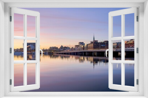 Idyllic scene of Stockholm cityscape on the shore at sunset in Sweden