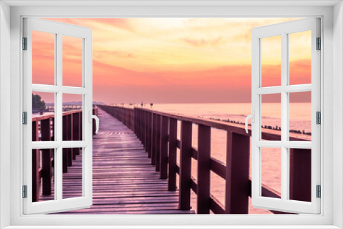 Fototapeta Naklejka Na Ścianę Okno 3D - Sea view near mangrove forest with man made wooden barrier for wave protection, under morning twilight colorful sky in Bangkok, Thailand