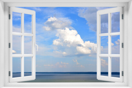 Fototapeta Naklejka Na Ścianę Okno 3D - sky with white clouds flying above the sea isolated copy space 