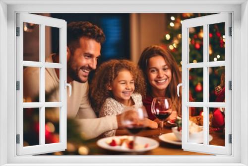 Winter holidays and people concept - happy family at the table celebrating christmas and new year. Home holiday. Blurred background. Selective focus.