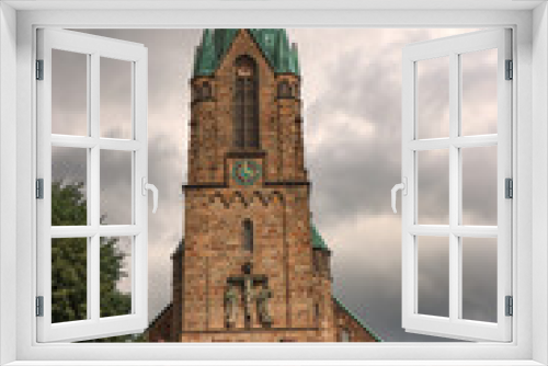 Fototapeta Naklejka Na Ścianę Okno 3D - Blickfang im münsterländischen Harsewinkel; St. Lucia vom Rathaus gesehen