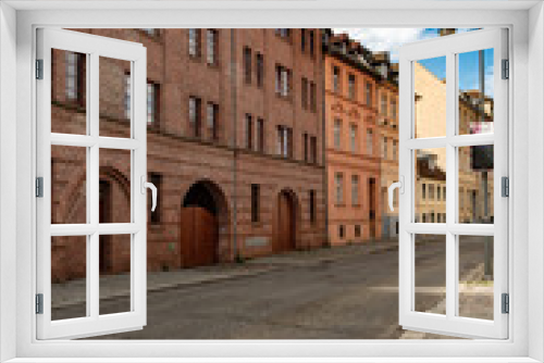 Fototapeta Naklejka Na Ścianę Okno 3D - Mühlendamm Architektonisch schön wirkt die Straße der Neustadt in Brandenburg an der Havel urgemütlich und bei schönstem wetter auch einladend 