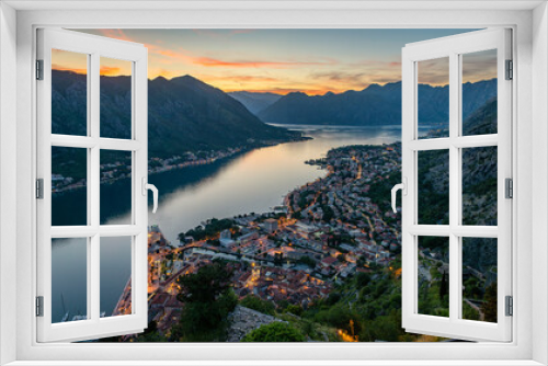 Fototapeta Naklejka Na Ścianę Okno 3D - Panoramic evening view of the old town and the Bay of Kotor from above. The Bay of Kotor is the beautiful place on the Adriatic Sea. Kotor, Montenegro.