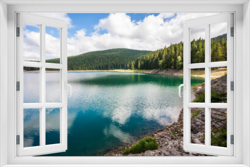 Fototapeta Naklejka Na Ścianę Okno 3D - A beautiful lake in the mountains.