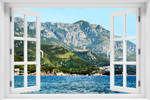 Fototapeta Naklejka Na Ścianę Okno 3D - Montenegro. Becici. View from the beach to the mountains and the sea