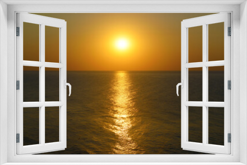 Fototapeta Naklejka Na Ścianę Okno 3D - Sunset with sun path on surface of sea.