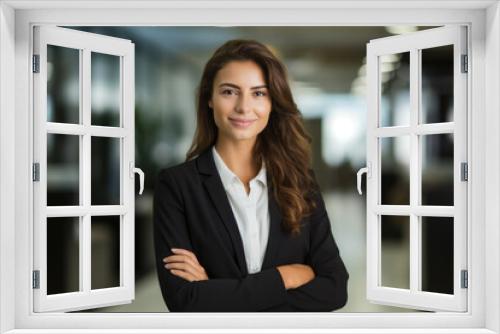 A Confident and Stylish Businesswoman in a Modern Black Suit, Exploring New Opportunities in a Professional Office Environment