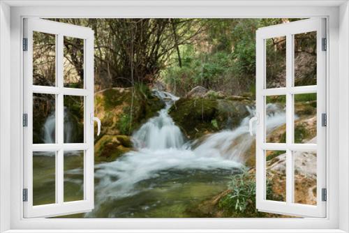 Fototapeta Naklejka Na Ścianę Okno 3D - The Guadalquivir river as it passes through the Utrero cerrado, in the Cazorla, Segura and Las Villas mountains. Jaen. Andalusia. Spain.