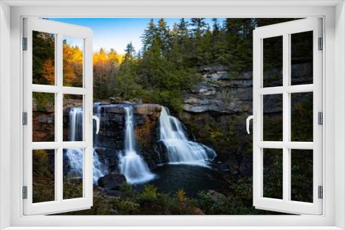 Fototapeta Naklejka Na Ścianę Okno 3D - Awe-inspiring landscape featuring Blackwater Falls surrounded by lush vegetation. West Virginia.