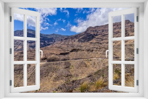 Fototapeta Naklejka Na Ścianę Okno 3D - Scenic view of a barren mountain range