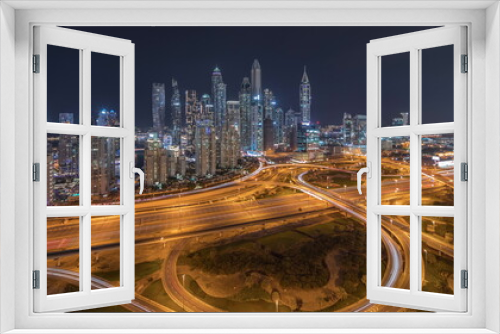Fototapeta Naklejka Na Ścianę Okno 3D - Dubai Marina highway intersection spaghetti junction night timelapse