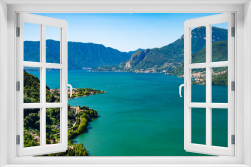 Fototapeta Naklejka Na Ścianę Okno 3D - A view of Lake Como from the church of San Rocco, in Dorio, towards the south, with Bellagio, the mountains, the panorama.