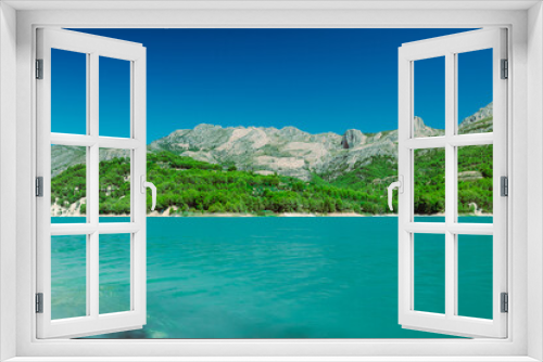 Fototapeta Naklejka Na Ścianę Okno 3D - A beautiful mountain landscape, a view of the mountains and a lake with turquoise water, there is a place for an inscription. High quality photo