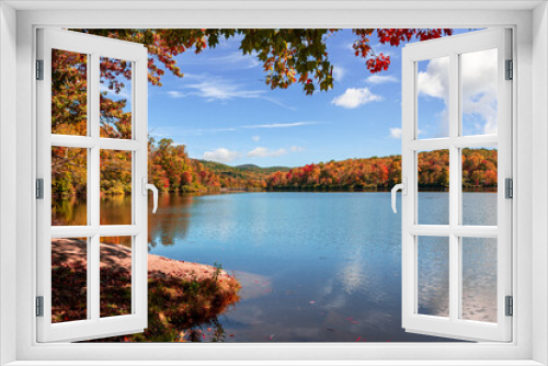 Fototapeta Naklejka Na Ścianę Okno 3D - View of Price Lake in Julian Price Park on Blue Ridge Parkway near Blowing Rock, North Carolina in fall season.