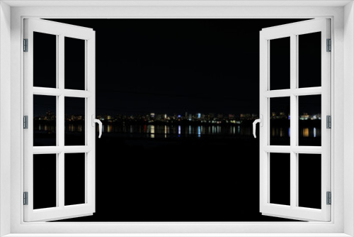 Fototapeta Naklejka Na Ścianę Okno 3D - night city of Burgas landscape reflected in Lake Atanasovo
