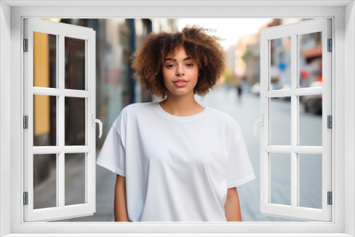 Attractive young woman wearing blank empty oversize white t-shirt mockup for design template