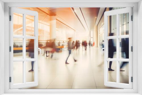 blurred business people walking at a trade fair, conference or walking in a modern hall