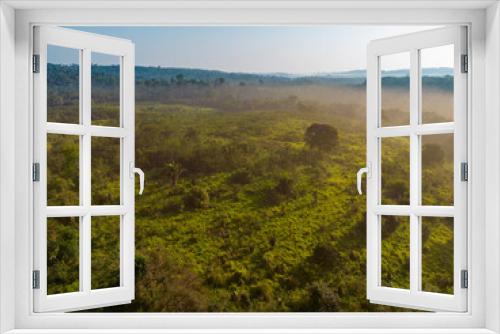 Fototapeta Naklejka Na Ścianę Okno 3D - Drone shot - bird's eye view of the lush green landscape along the famous earth road Transamazonica towards Santarém through the Amazon rainforest in dry season in northern Brazil, South America