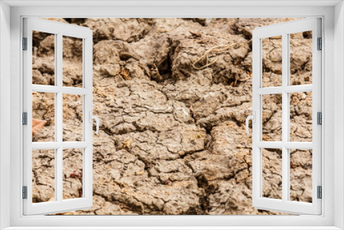 Fototapeta Naklejka Na Ścianę Okno 3D - Closeup of dry soil.