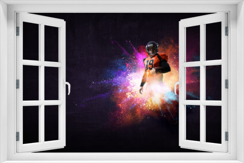 Fototapeta Naklejka Na Ścianę Okno 3D - Football player agaisnt colourful background