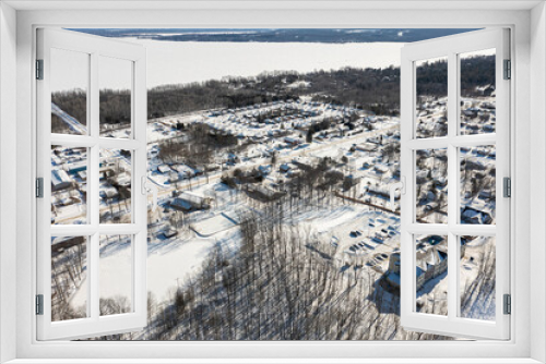 Fototapeta Naklejka Na Ścianę Okno 3D - Discover Barrie's tranquil outskirts with mesmerizing aerial views of Lake Simcoe. These drone photos capture the town's scenic beauty, making them ideal for local businesses, tourism agencies, and na