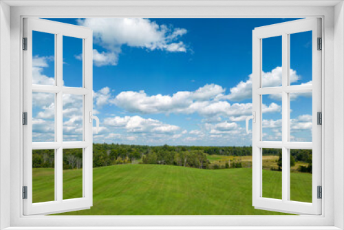 Fototapeta Naklejka Na Ścianę Okno 3D - Puffy Clouds and Blue Skies