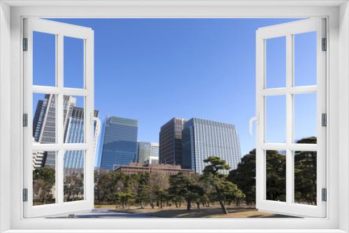 Fototapeta Naklejka Na Ścianę Okno 3D - 快晴青空 丸の内の高層ビル街