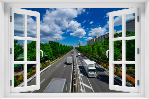 Fototapeta Naklejka Na Ścianę Okno 3D - A traffic jam at the downtown street in Takashimadaira Tokyo wide shot