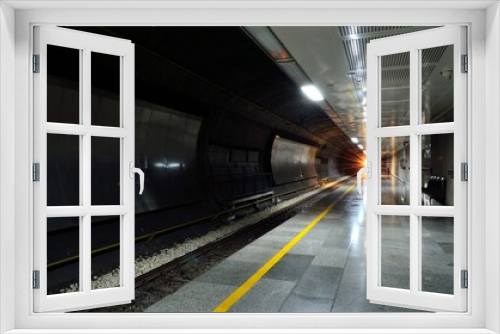 Fototapeta Naklejka Na Ścianę Okno 3D - Train approaching an empty station