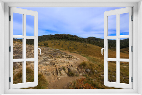 Fototapeta Naklejka Na Ścianę Okno 3D - Blue morning sky above the rocks and trail through the Horton Plains, Sri Lanka