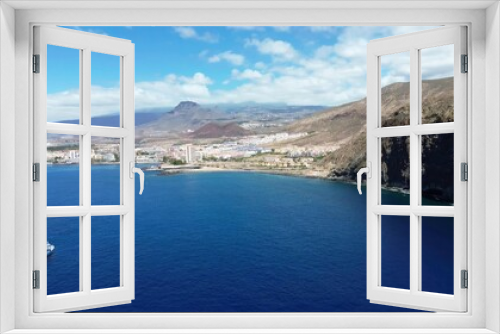Fototapeta Naklejka Na Ścianę Okno 3D - Drone view of many hotels at the beach on the Canary Island of Tenerife