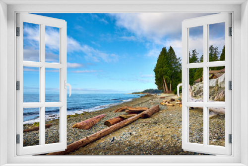 Fototapeta Naklejka Na Ścianę Okno 3D - Driftwood at Henderson Beach. Roberts Creek, Sunshine Coast, British Columbia, Canada. Beautiful Pacific Coast of Canada