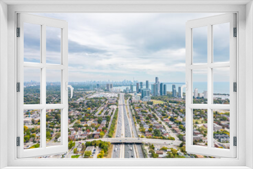 Fototapeta Naklejka Na Ścianę Okno 3D - Explore the breathtaking cityscape of downtown Toronto and South Etobicoke captured through stunning drone photos in the vibrant colors of the fall season. Immerse yourself in the beauty.