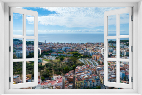 Fototapeta Naklejka Na Ścianę Okno 3D - Resort town on the Mediterranean coast in Spain. Drone view of the city of Lloret De Mar.