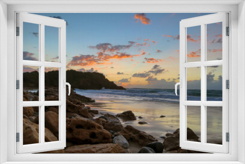 Fototapeta Naklejka Na Ścianę Okno 3D - Sunset on the long rocky shore